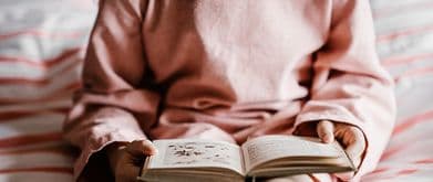 child reading poetry book