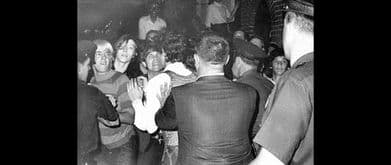 police clash with stonewall inn patrons in the only known photo of the Stonewall riots