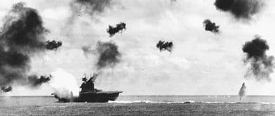 USS Yorktown is hit by a torpedo in the battle of midway, part of the pacific war in wwII