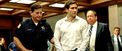 man being arrested in a courtroom. 