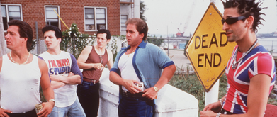 five guys standing in front of a dead end sign