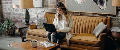 Woman on her laptop at a cafe